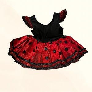 Sweet little ladybug costume perfect for a day of imaginative fun.